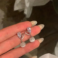 1 paio di orecchini di diamanti in vetro con perle d'imitazione d'amore in lega placcata oro di lusso leggero e vento freddo