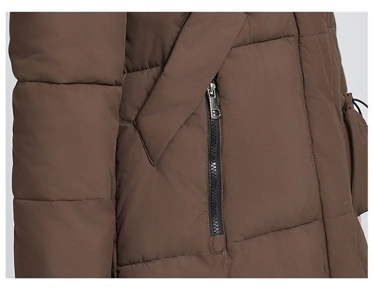 Caldo piumino in cotone da donna Inverno 2025 Nuova versione coreana Cappotto lungo con cappuccio allentato Cappotto Parka spesso antivento femminile