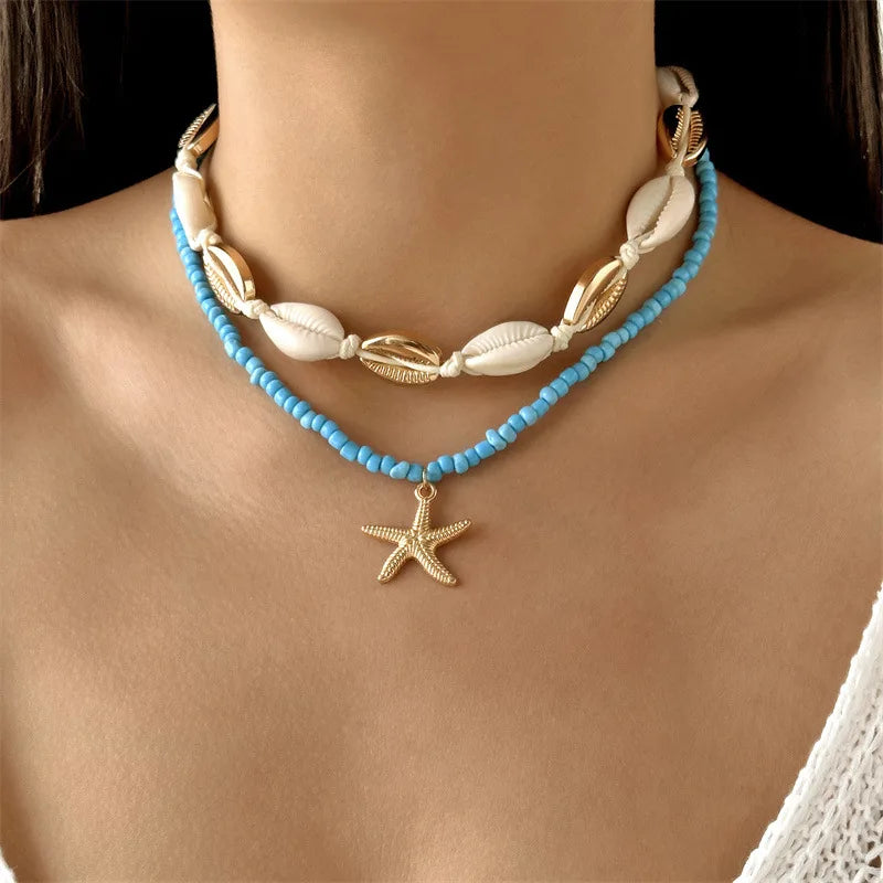 Collana con ciondolo stella marina con perline di riso bohémien per donna, fatta a mano, perla d'imitazione, girocollo con perline colorate, gioielli da spiaggia estiva