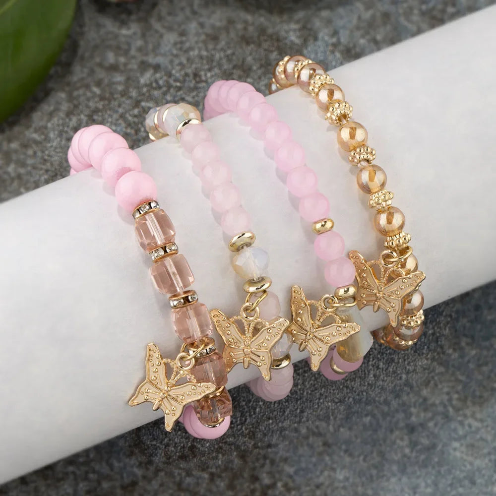 Set di braccialetti con perline a farfalla alla moda da 4 pezzi per le donne, perline acriliche rosa, braccialetto a catena elastica, regalo di gioielli per feste bohémien femminili