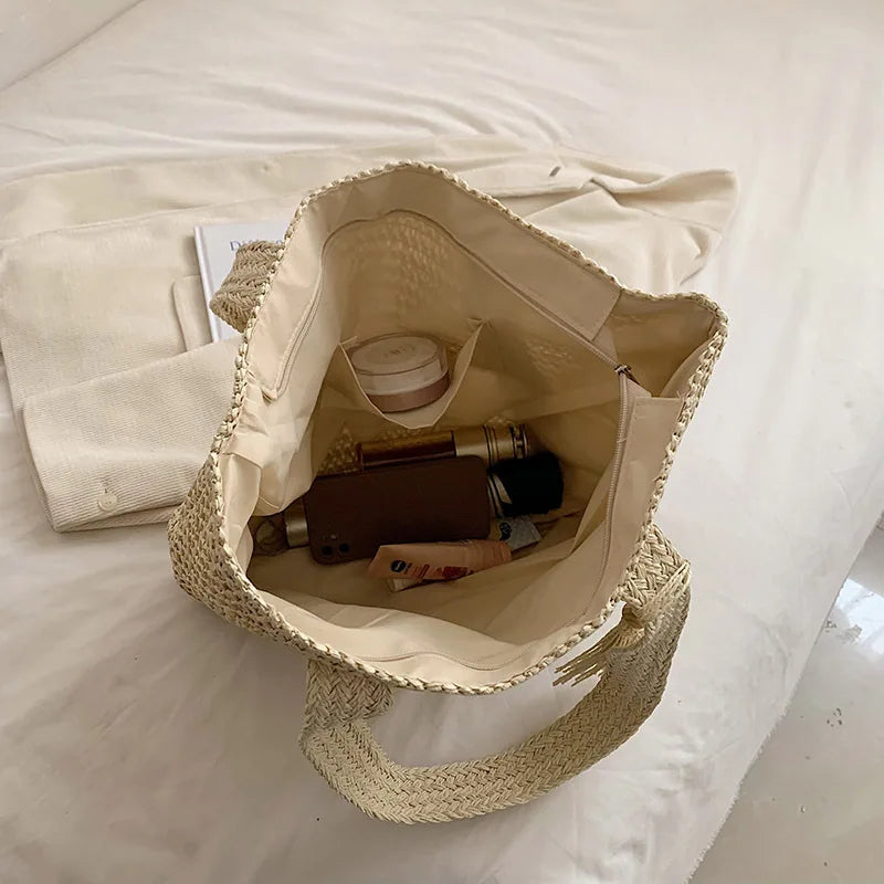 Borsa a tracolla tessuta estiva borsa da spiaggia da donna borsa da viaggio con nappe da viaggio in paglia lavorata a maglia fatta a mano di grande capacità