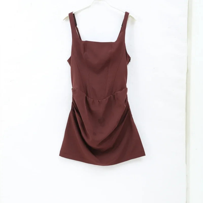Abito mini fionda con orlo a pieghe Bown Donna Elegante scollo a U senza maniche Fasciatura senza schienale Abiti slim 2025 Abito estivo da donna