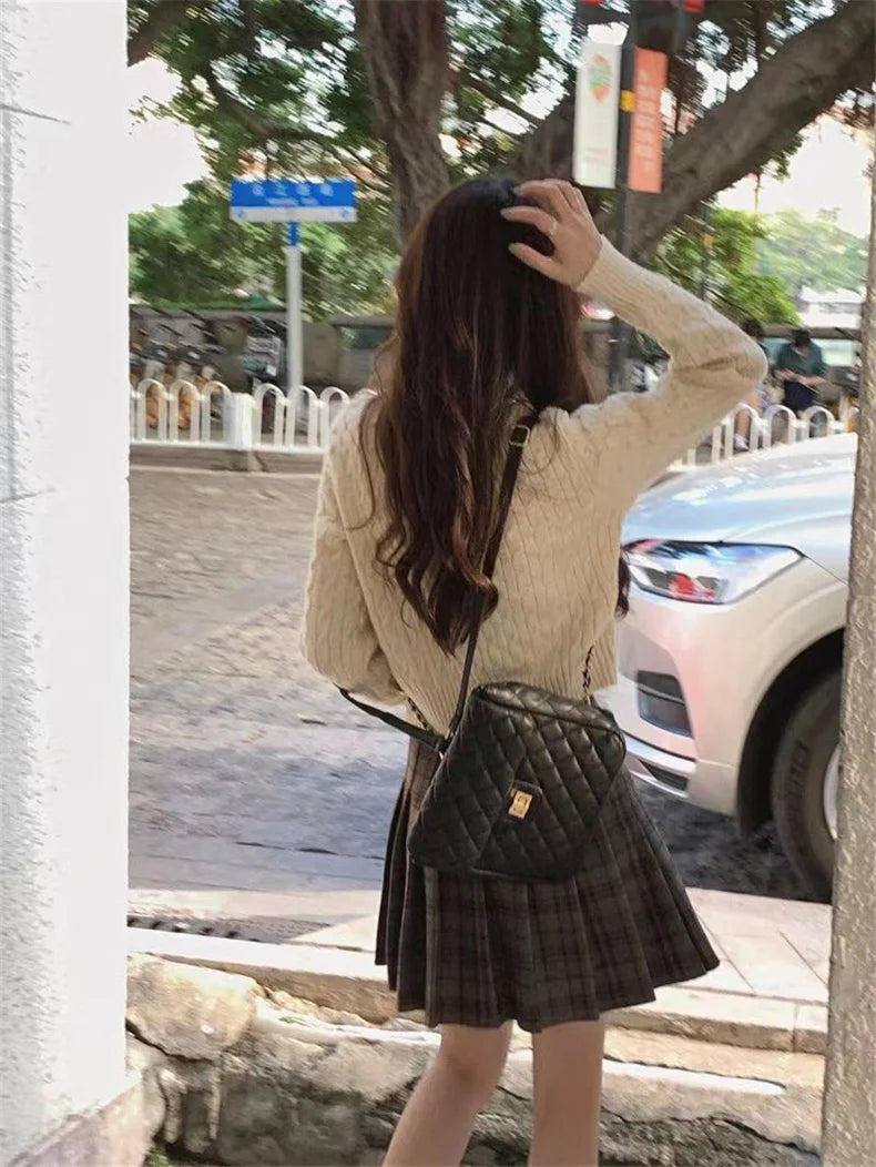 Bottoni Slim caldi in lana invernale da donna O collo maglieria corta coreano Harajuku moda manica lunga lavorato a maglia con collo elastico Top