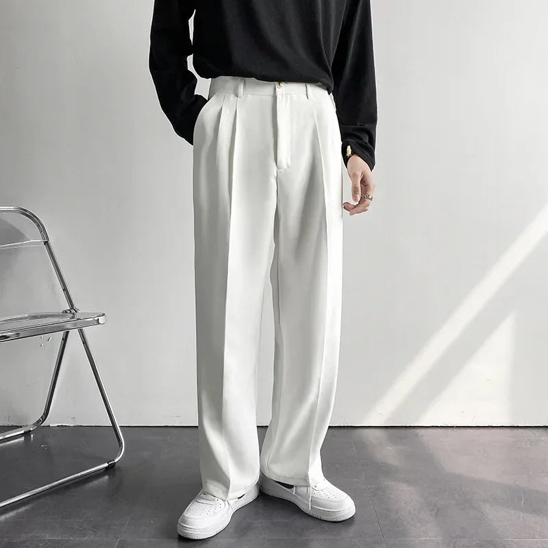 2024 primavera autunno uomo alla moda bianco stile coreano pantaloni Casual strada drappeggiato dritto abito allentato pantaloni Casual maschile
