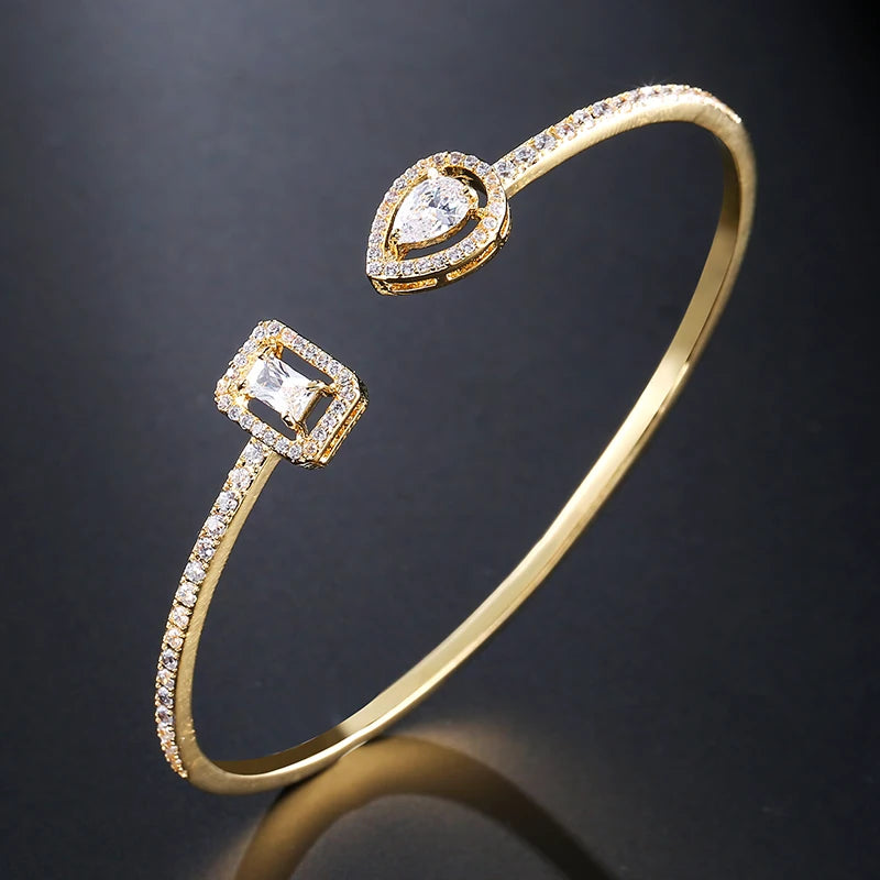 Braccialetti con polsino color oro con geometria di lusso per le donne Braccialetti con zirconi cubici alla moda INS Gioielli per feste quotidiane.