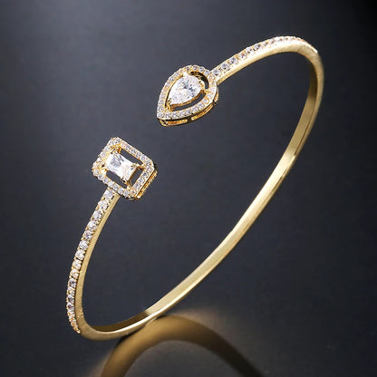 Braccialetti con polsino color oro con geometria di lusso per le donne Braccialetti con zirconi cubici alla moda INS Gioielli per feste quotidiane.