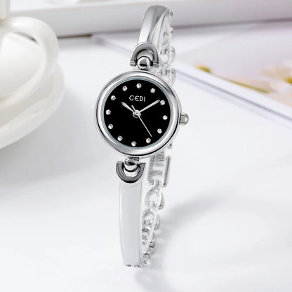 UTHAI W34 Orologio da polso da donna Luce di lusso Semplice squisito quadrante rotondo Orologio impermeabile Lady Fashion Orologi al quarzo coreani