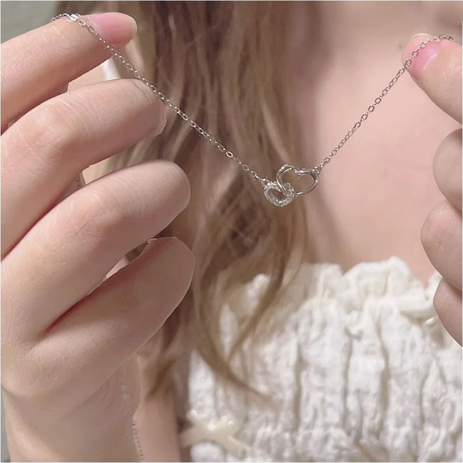 Collana di nuova moda semplice color argento con ciondolo a forma di cuore d'amore, collana con ciondoli a catena, per gioielli da festa da donna, da indossare ogni giorno