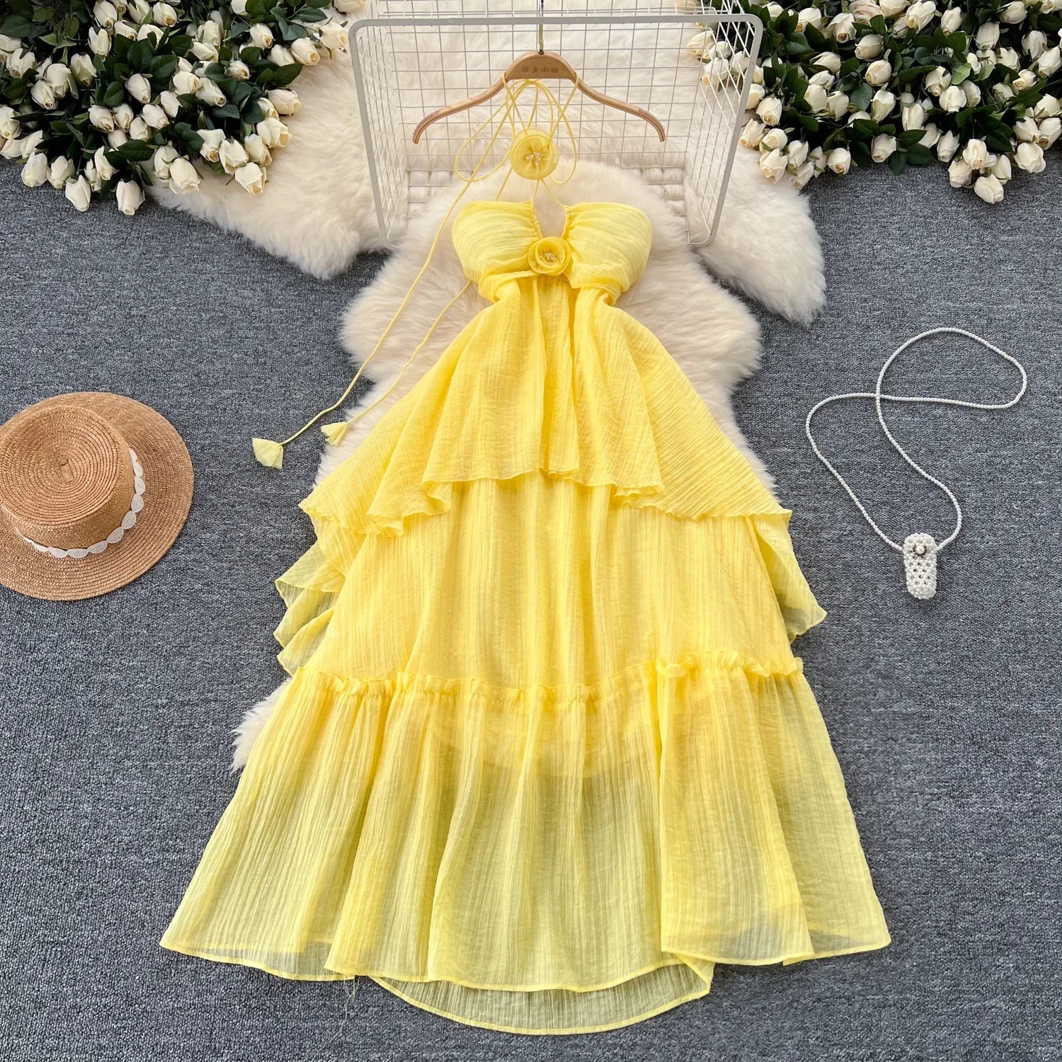 Elegante dolce vita alta scava fuori asimmetrico fiore tridimensionale abito halter vacanza sottile abiti estivi da festa per donna