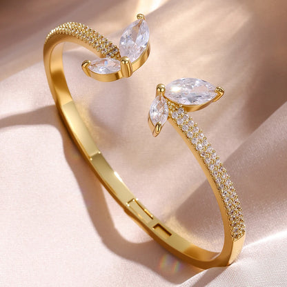 Braccialetti con polsino color oro con geometria di lusso per le donne Braccialetti con zirconi cubici alla moda INS Gioielli per feste quotidiane.
