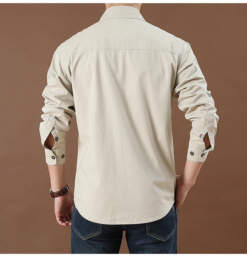 100% cotone di alta qualità primavera autunno moda uomo manica lunga tinta unita camicia Casual Multi tasca 6XL giacca Cargo di grandi dimensioni
