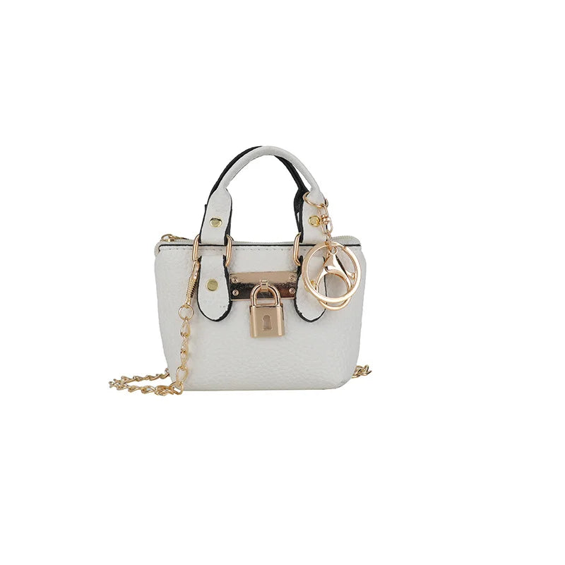 Borsa quadrata piccola da ragazza a tracolla per l'estate 2025, i nuovi bambini classici che portano una borsa a tracolla monospalla. portachiavi portafoglio