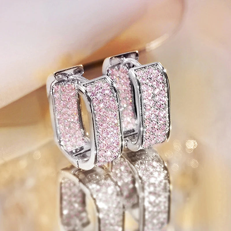 Huitan Orecchini a cerchio CZ pavimentati alla moda coreana per le donne Orecchini per ragazze semplici e versatili in metallo color argento/oro Gioielli caldi