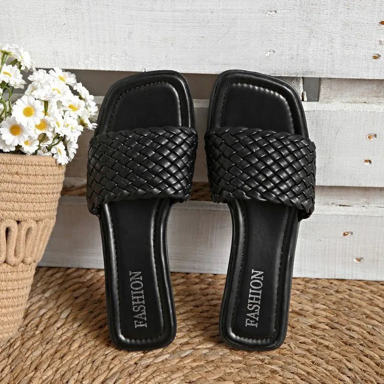 Sandales d'été pour femmes Luxe Mode Fond plat Pantoufles Décontracté Simple Couleur unie Sangle tissée à un mot Sandales de plage