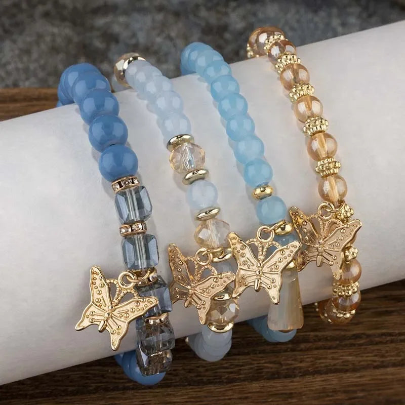 Set di braccialetti con perline a farfalla alla moda da 4 pezzi per le donne, perline acriliche rosa, braccialetto a catena elastica, regalo di gioielli per feste bohémien femminili