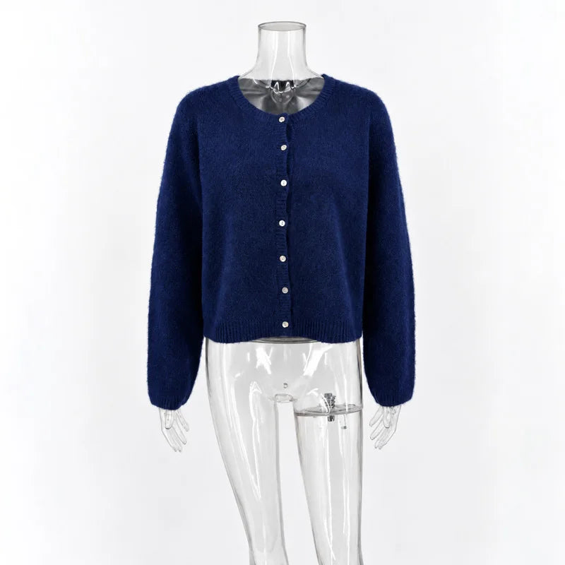 Cardigan in maglia pelosa Tossy a maniche lunghe con bottoni frontali, corto, in mohair, casual, morbido al tatto, a tinta unita, per donna, inverno 2026.