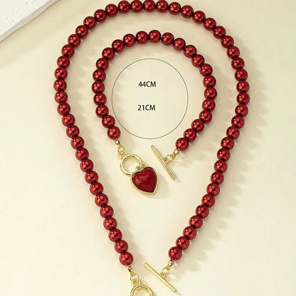 Set di gioielli con bracciale e collana di perle imitazione da 2 pezzi. Elegante collare con perline di colore naturale con ciondolo color perla per ragazza