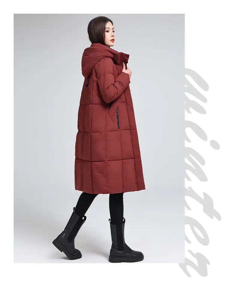 Caldo piumino in cotone da donna Inverno 2025 Nuova versione coreana Cappotto lungo con cappuccio allentato Cappotto Parka spesso antivento femminile