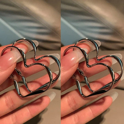 1 paio di orecchini a cerchio con ciondolo a forma di cuore cavo grande da donna, moda esagerata, design a forma di cuore, polsino per regalo di gioielli per ragazze