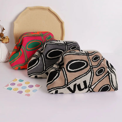 Borsa con clip lavorata a maglia alla moda versatile di grande capacità adatta per borse portaoggetti Nuova pochette modello di fascia alta