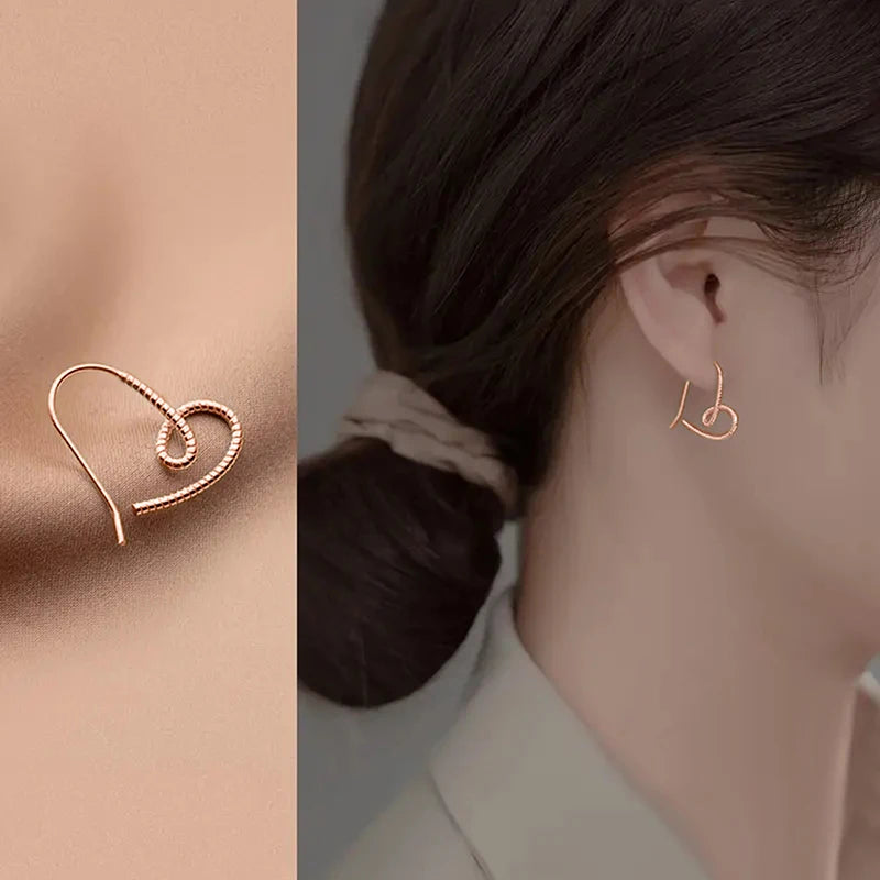 Huitan Twist Design Cuore Gancio per l'orecchio Orecchini femminili semplici alla moda Accessori stile metallizzato Gioielli d'amore per l'uso quotidiano