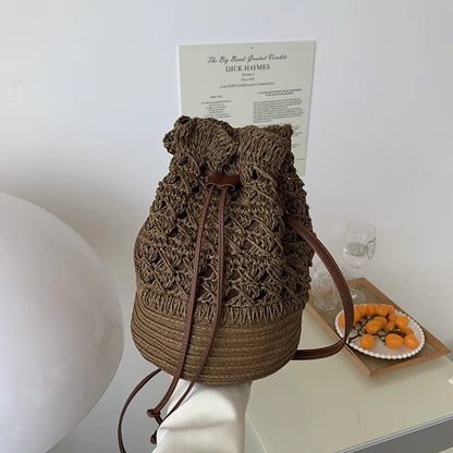 Borsa a tracolla da spiaggia in paglia estiva da donna fatta a mano borsa a tracolla con coulisse cava intrecciata borsa da viaggio con Design femminile di moda lavorata a maglia