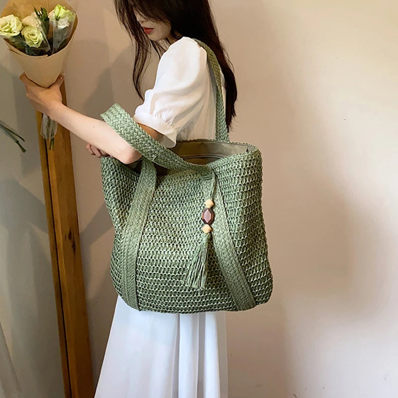 Borsa a tracolla tessuta estiva borsa da spiaggia da donna borsa da viaggio con nappe da viaggio in paglia lavorata a maglia fatta a mano di grande capacità