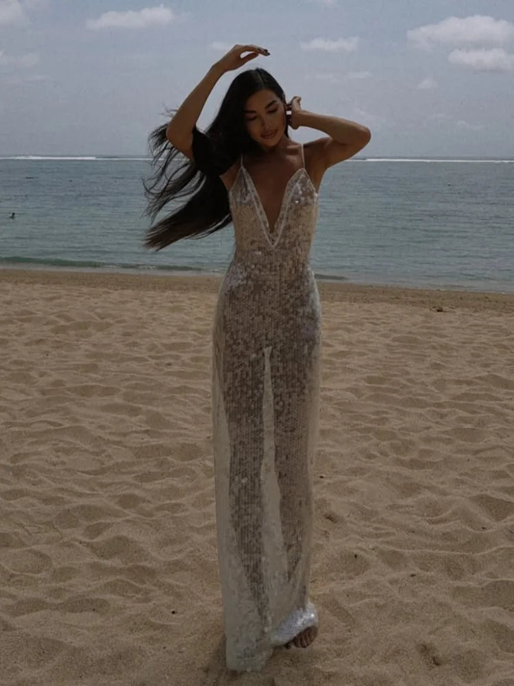 Abito trasparente con cinturino per spaghetti con paillettes Abito da donna sexy con scollo a V in pizzo profondo aderente Abiti da festa da spiaggia 2025 Abito da vacanza elegante e chic