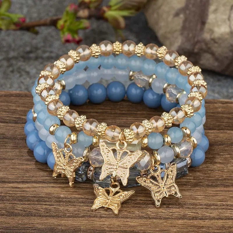 Set di braccialetti con perline a farfalla alla moda da 4 pezzi per le donne, perline acriliche rosa, braccialetto a catena elastica, regalo di gioielli per feste bohémien femminili