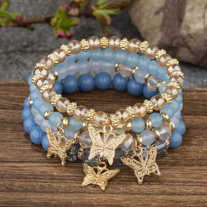 Set di braccialetti con perline a farfalla alla moda da 4 pezzi per le donne, perline acriliche rosa, braccialetto a catena elastica, regalo di gioielli per feste bohémien femminili