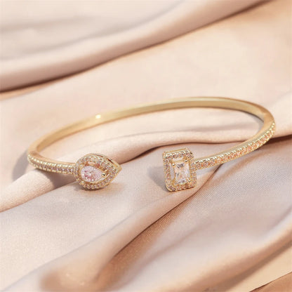 Braccialetti con polsino color oro con geometria di lusso per le donne Braccialetti con zirconi cubici alla moda INS Gioielli per feste quotidiane.