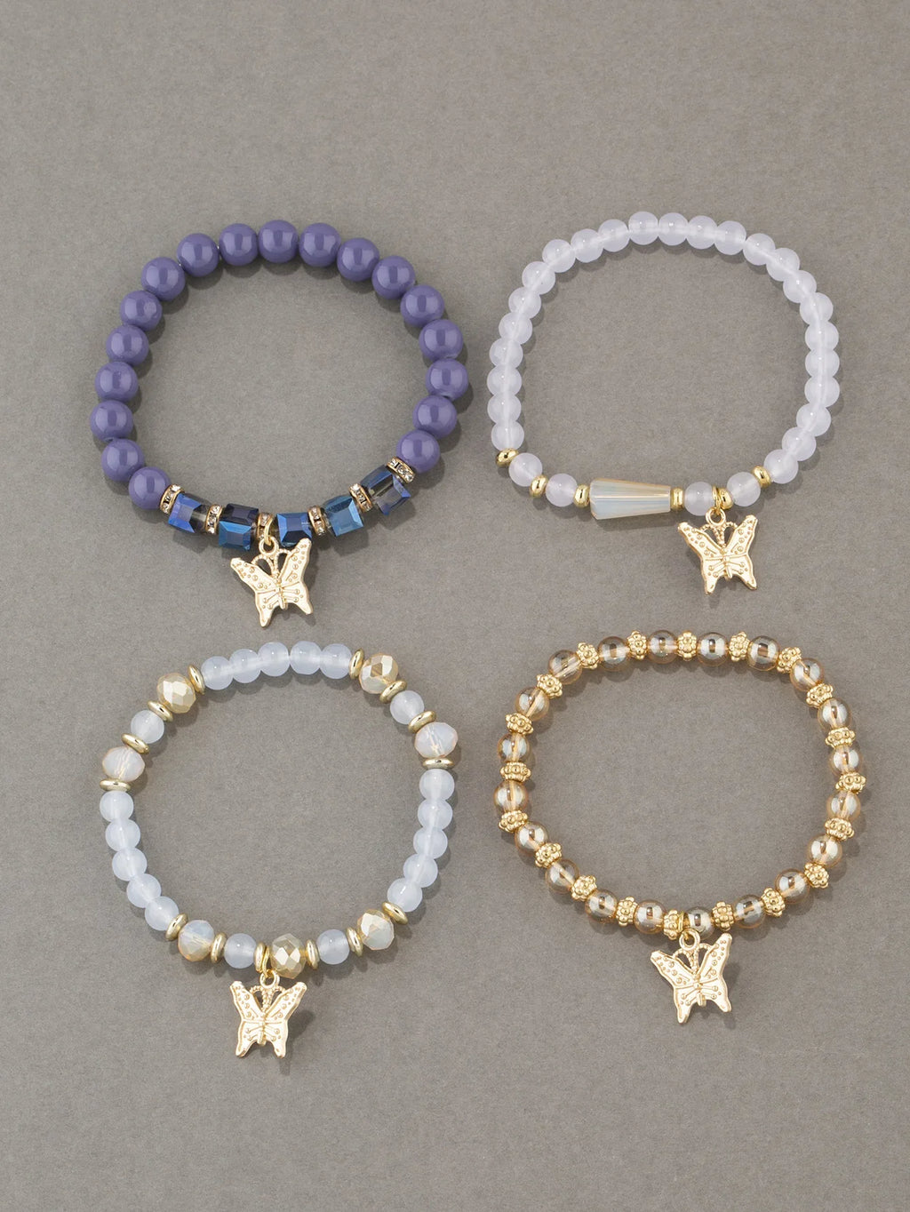 Set di braccialetti con perline a farfalla alla moda da 4 pezzi per le donne, perline acriliche rosa, braccialetto a catena elastica, regalo di gioielli per feste bohémien femminili