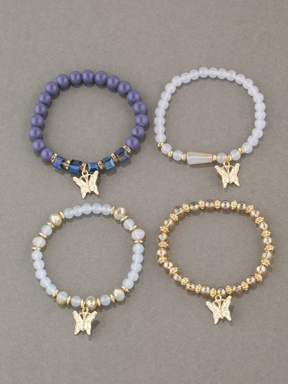 Set di braccialetti con perline a farfalla alla moda da 4 pezzi per le donne, perline acriliche rosa, braccialetto a catena elastica, regalo di gioielli per feste bohémien femminili