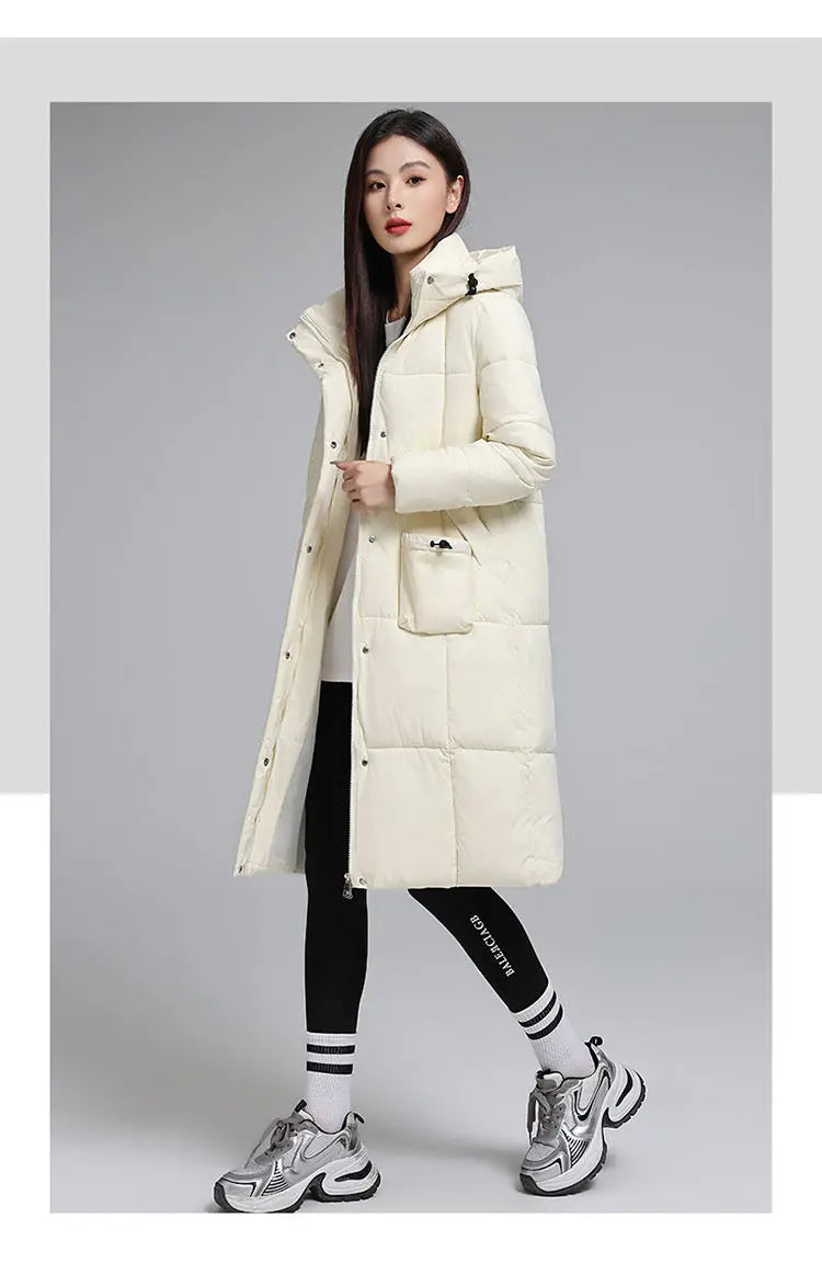 Caldo piumino in cotone da donna Inverno 2025 Nuova versione coreana Cappotto lungo con cappuccio allentato Cappotto Parka spesso antivento femminile