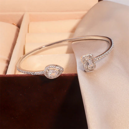 Braccialetti con polsino color oro con geometria di lusso per le donne Braccialetti con zirconi cubici alla moda INS Gioielli per feste quotidiane.