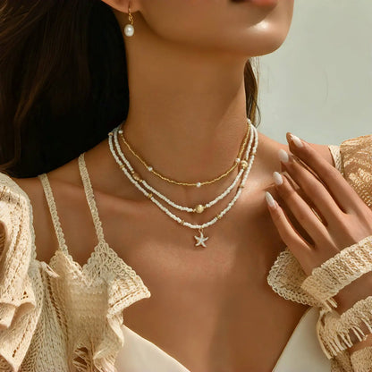 Girocollo impilato con perline fatte a mano bohémien, delicato collana con ciondolo a conchiglia di stelle marine, gioielli da donna per feste estive in spiaggia