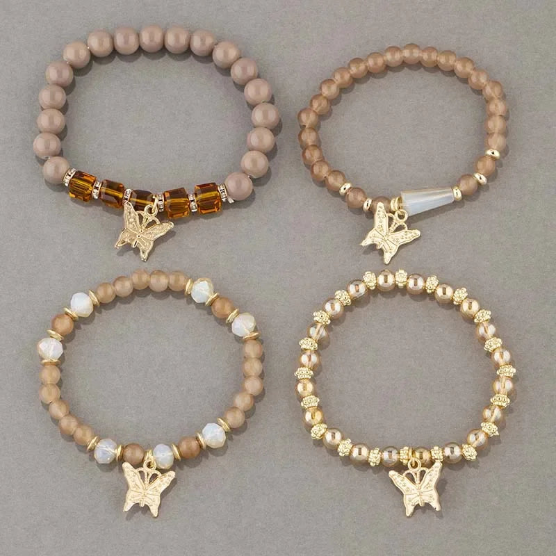 Set di braccialetti con perline a farfalla alla moda da 4 pezzi per le donne, perline acriliche rosa, braccialetto a catena elastica, regalo di gioielli per feste bohémien femminili