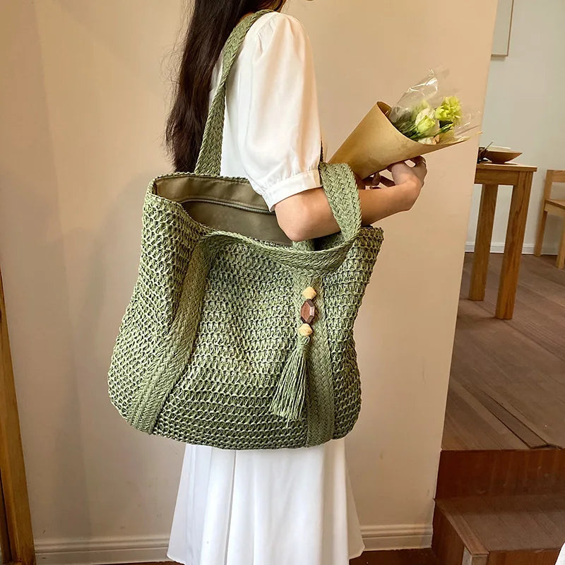 Borsa a tracolla tessuta estiva borsa da spiaggia da donna borsa da viaggio con nappe da viaggio in paglia lavorata a maglia fatta a mano di grande capacità