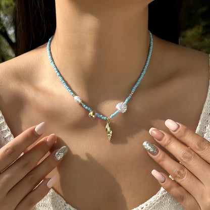 Collana con ciondolo stella marina con perline di riso bohémien per donna, fatta a mano, perla d'imitazione, girocollo con perline colorate, gioielli da spiaggia estiva