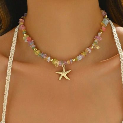 Collana con ciondolo stella marina con perline di riso bohémien per donna, fatta a mano, perla d'imitazione, girocollo con perline colorate, gioielli da spiaggia estiva