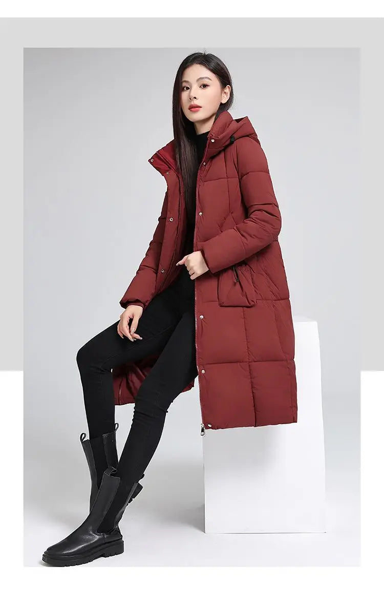 Caldo piumino in cotone da donna Inverno 2025 Nuova versione coreana Cappotto lungo con cappuccio allentato Cappotto Parka spesso antivento femminile