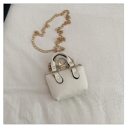 Borsa quadrata piccola da ragazza a tracolla per l'estate 2025, i nuovi bambini classici che portano una borsa a tracolla monospalla. portachiavi portafoglio
