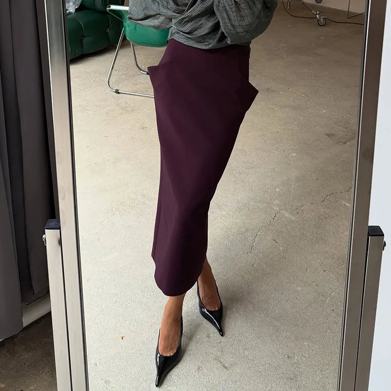 Gonna midi a vita alta stampata, con incrocio frontale e taglio dritto, collezione autunno 2026, gonna da donna per uso quotidiano, alla moda, elegante e casual.