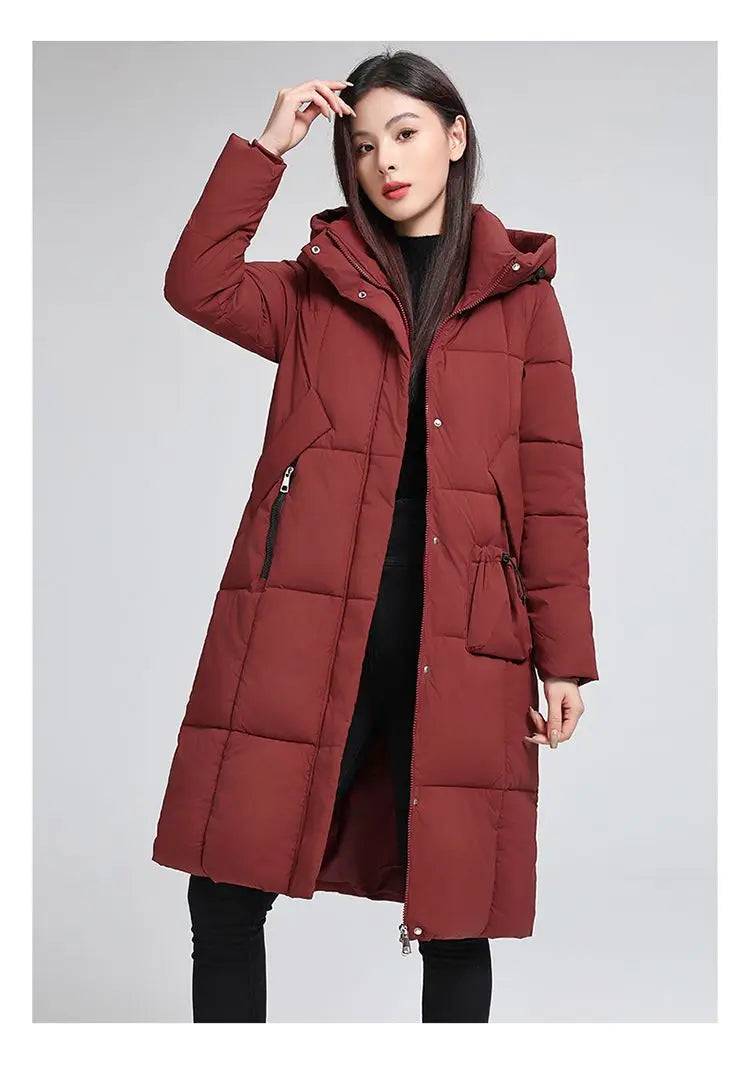 Caldo piumino in cotone da donna Inverno 2025 Nuova versione coreana Cappotto lungo con cappuccio allentato Cappotto Parka spesso antivento femminile