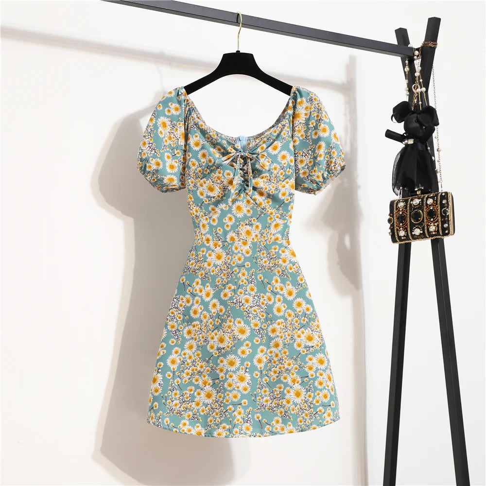 Mini abiti da donna Moda estiva Abiti femminili Stampa Abiti in chiffon floreale Abito casual con maniche corte a pieghe arricciate