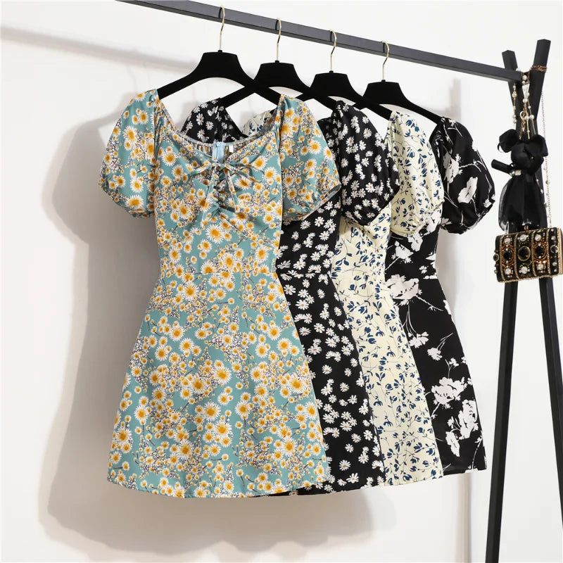 Mini abiti da donna Moda estiva Abiti femminili Stampa Abiti in chiffon floreale Abito casual con maniche corte a pieghe arricciate