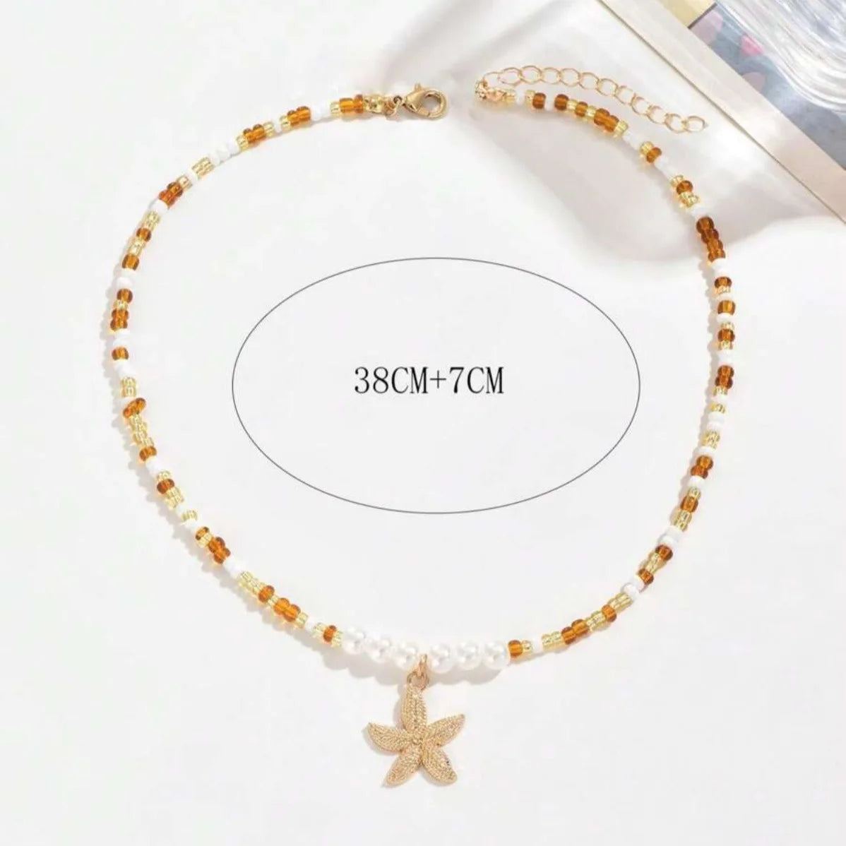 Collana con ciondolo stella marina con perline di riso bohémien per donna, fatta a mano, perla d'imitazione, girocollo con perline colorate, gioielli da spiaggia estiva