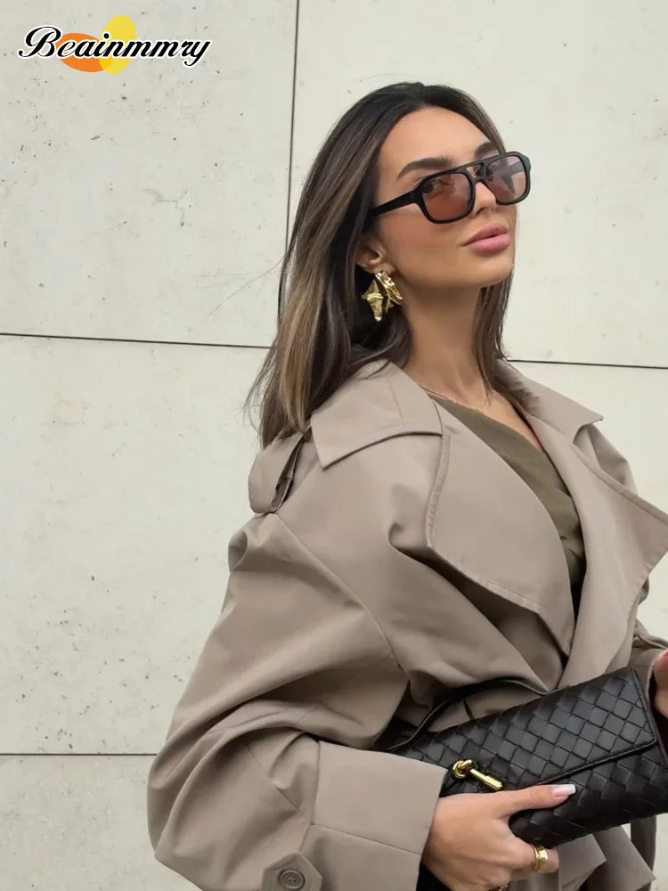 Trench con lacci con risvolto solido per le donne Moda maniche lunghe spalla larga cappotto corto allentato 2025 Nuovo autunno pendolari Outwear