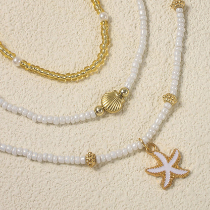 Girocollo impilato con perline fatte a mano bohémien, delicato collana con ciondolo a conchiglia di stelle marine, gioielli da donna per feste estive in spiaggia