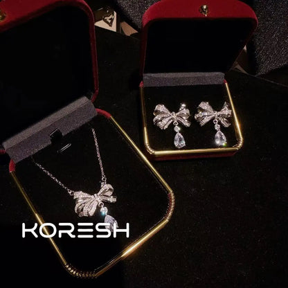 Collier pour femmes avec nœud et diamants, nouvelle parure de boucles d'oreilles pendantes en zircon pour femmes 2025